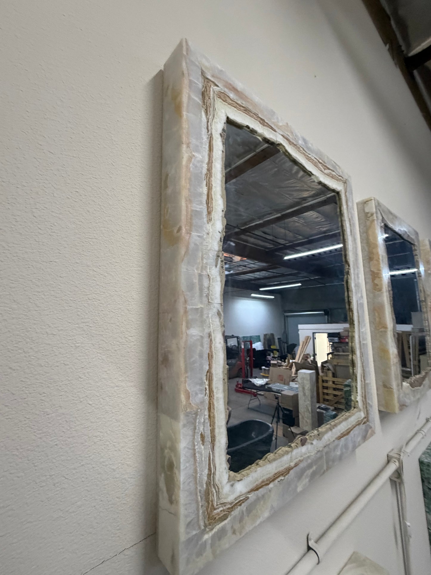 Set Of 2 White Vanity Backlit Onyx Mirrors with Brown Banding.