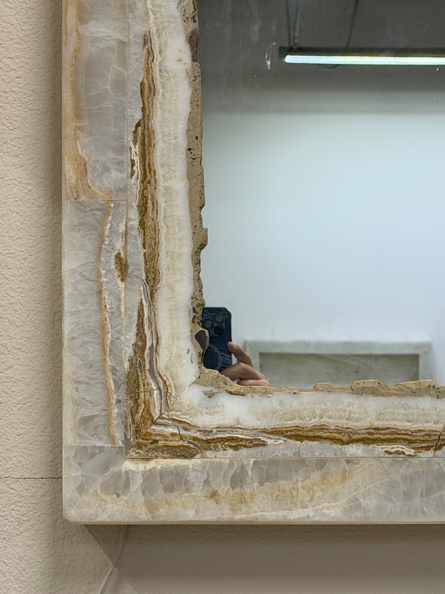 Set Of 2 White Vanity Backlit Onyx Mirrors with Brown Banding.