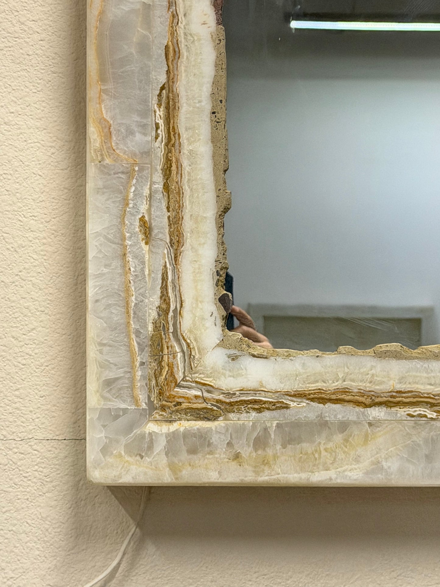 Set Of 2 White Vanity Backlit Onyx Mirrors with Brown Banding.