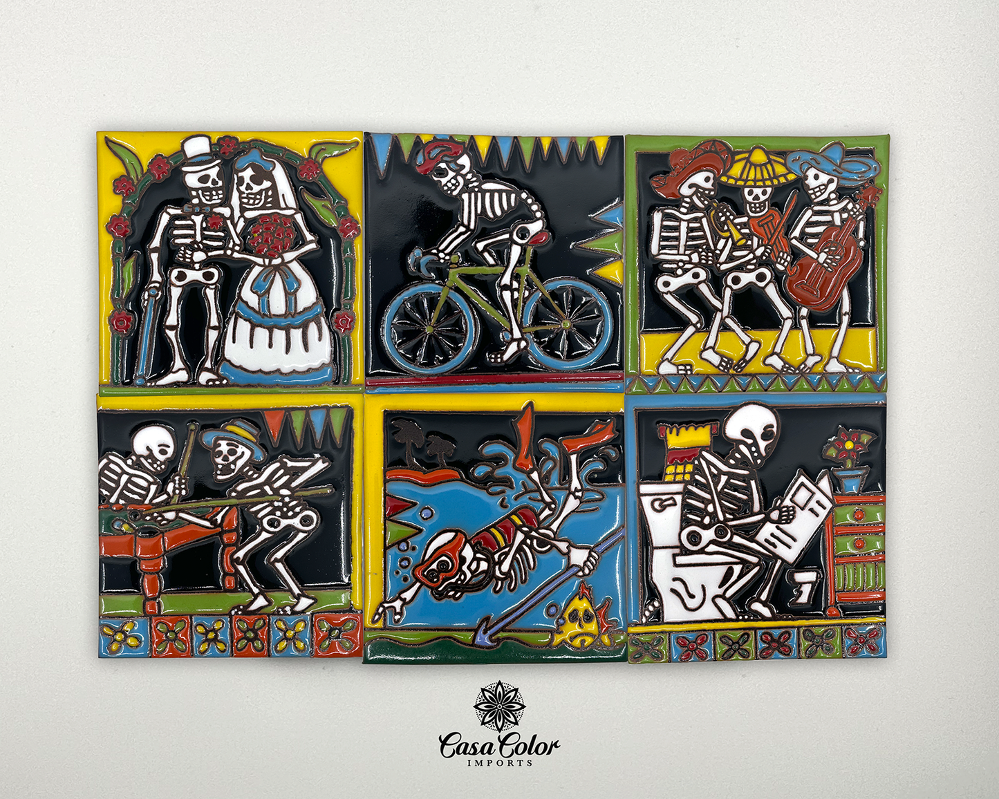 Talavera Mexican tile, Dia De Los Muertos design. The size is 6X6. The designs are: Wedding, biker, Mariachi, playing pool, diver and toilet. 