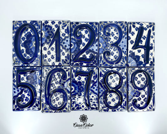 Talavera Street numbers. The color is white background with blue relief number and blue flowers. The size is approximately 5.5 " X 3.5" 