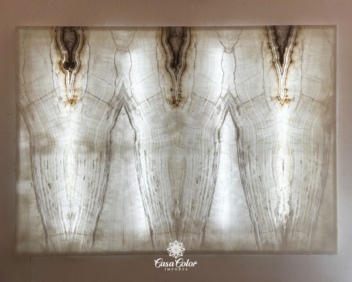 Stunning Hand-Cut Nacar Onyx Wall Panel with Black/Brown Beta. Backlit Wall Panel