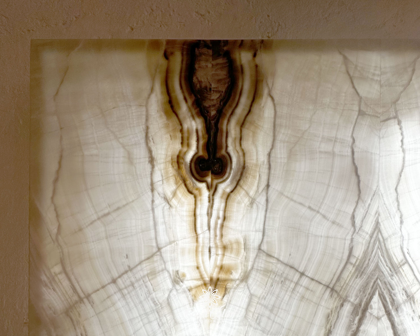 Stunning Hand-Cut Nacar Onyx Wall Panel with Black/Brown Beta. Backlit Wall Panel