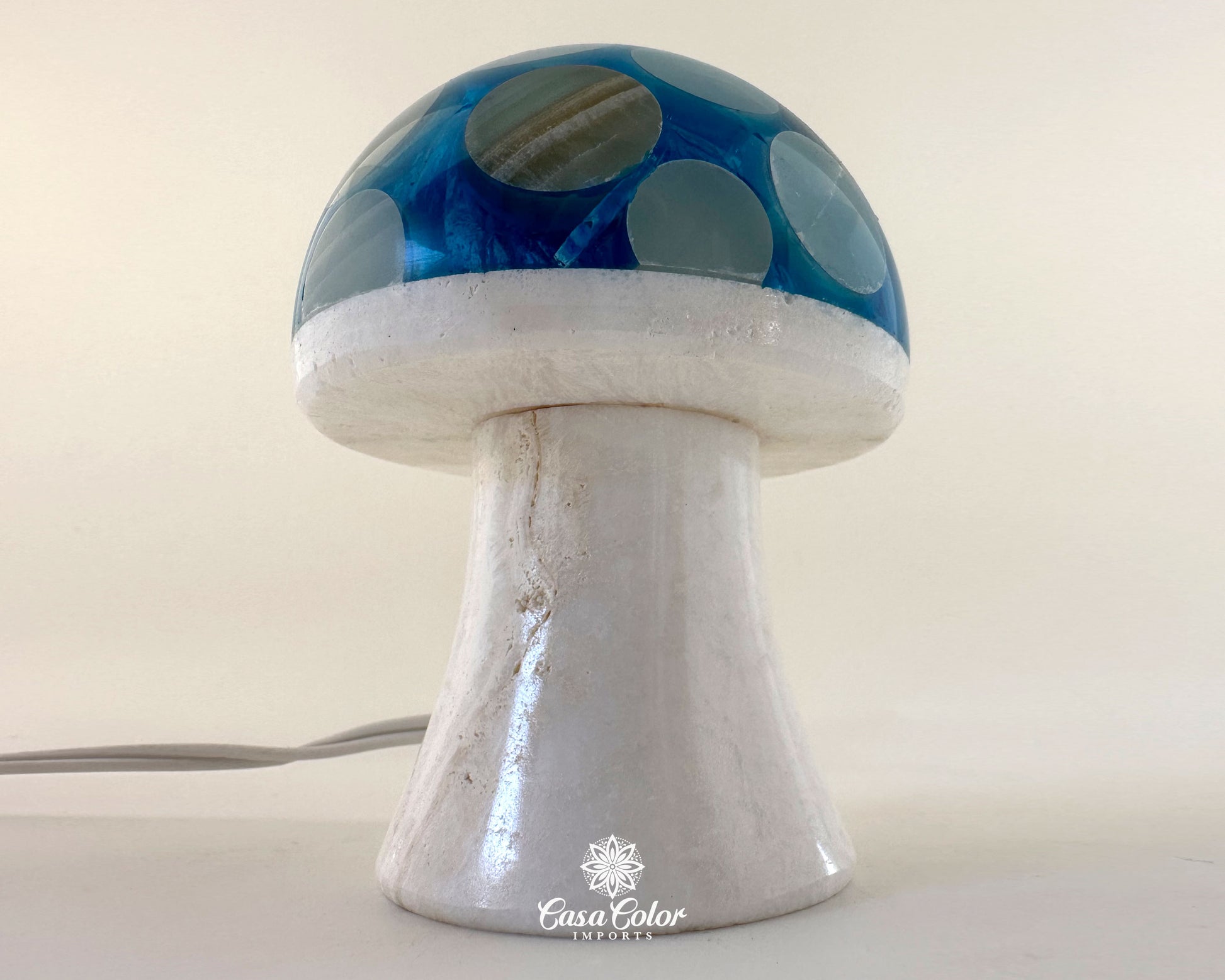 Onyx Mushroom night lamp. Blue top and white base.