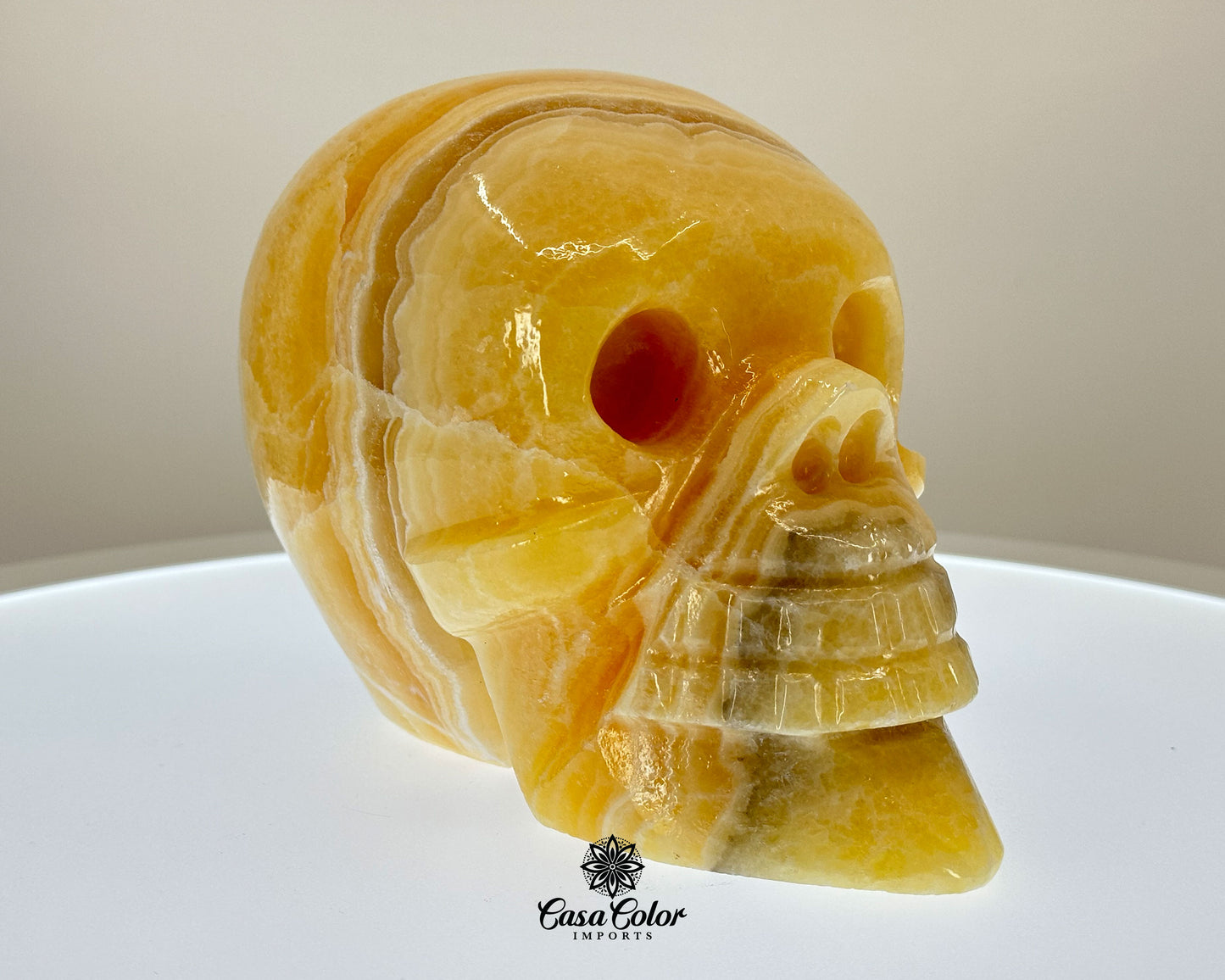 Glossy Orange and White Calcite Onyx Hand Carved Realistic Skull - 6.25"