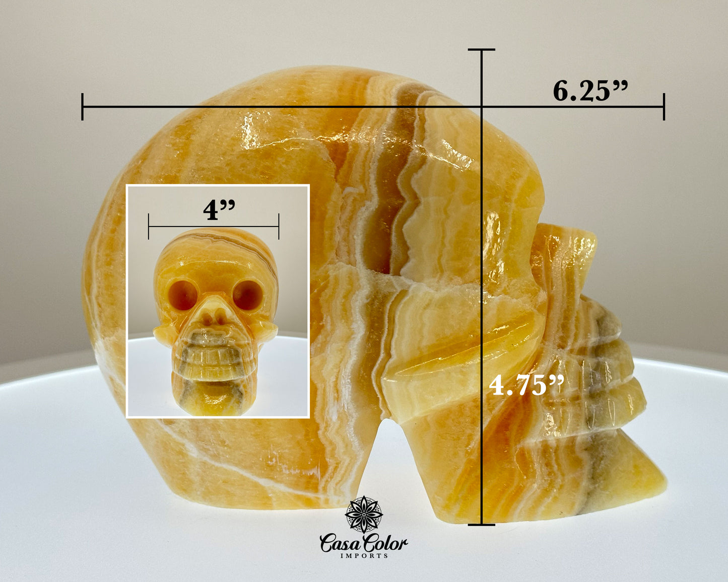 Glossy Orange and White Calcite Onyx Hand Carved Realistic Skull - 6.25"