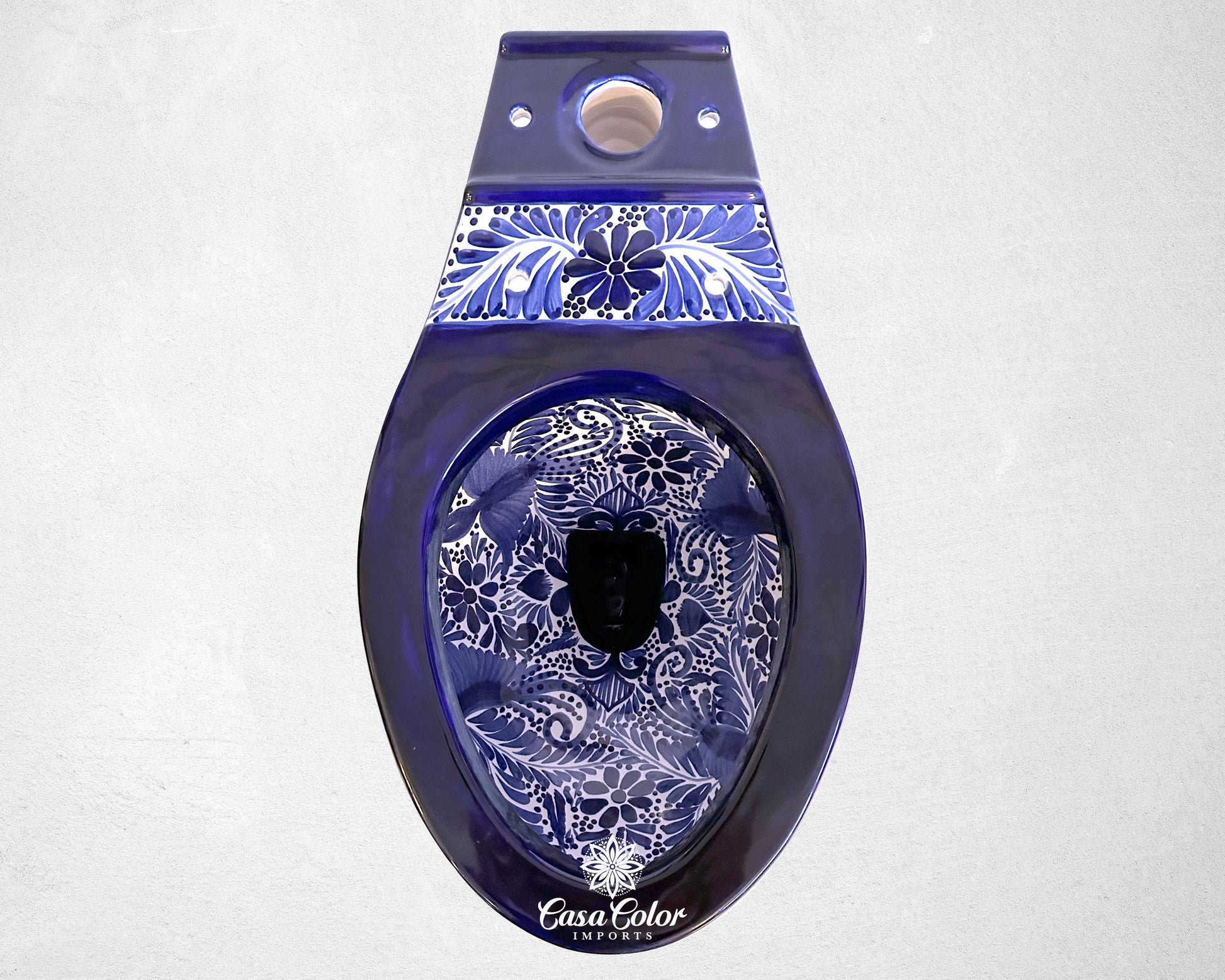 Talavera white and blue toilet. 