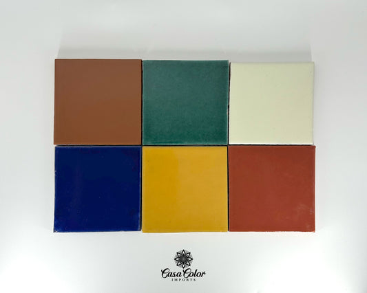 Mexican Talavera solid color tiles. Each tile is 4x4. The colors available are: Mustard, Green, Mexican white, blue, brown and reddish/brown. 