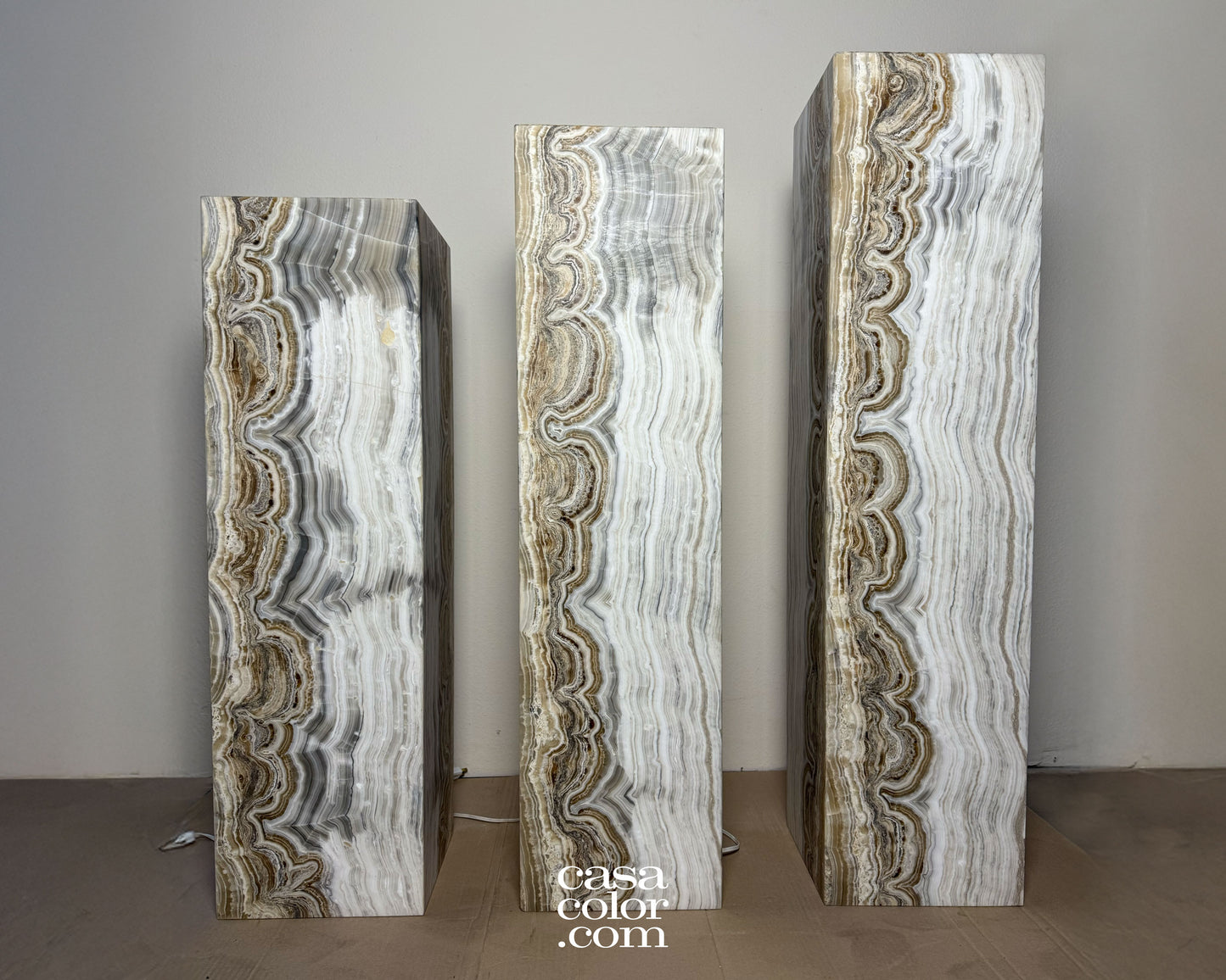 Magnificent Unique Set of Three Fiery Onyx Light Towers