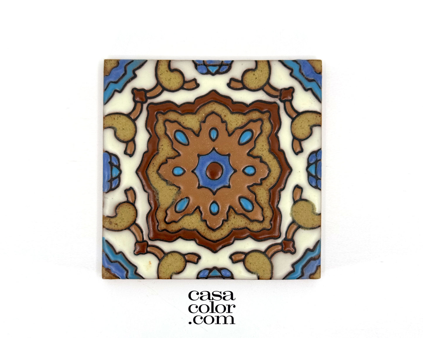 Blue and brown tile with a high relief surface. This tile is a 4 by 4 inch tile.