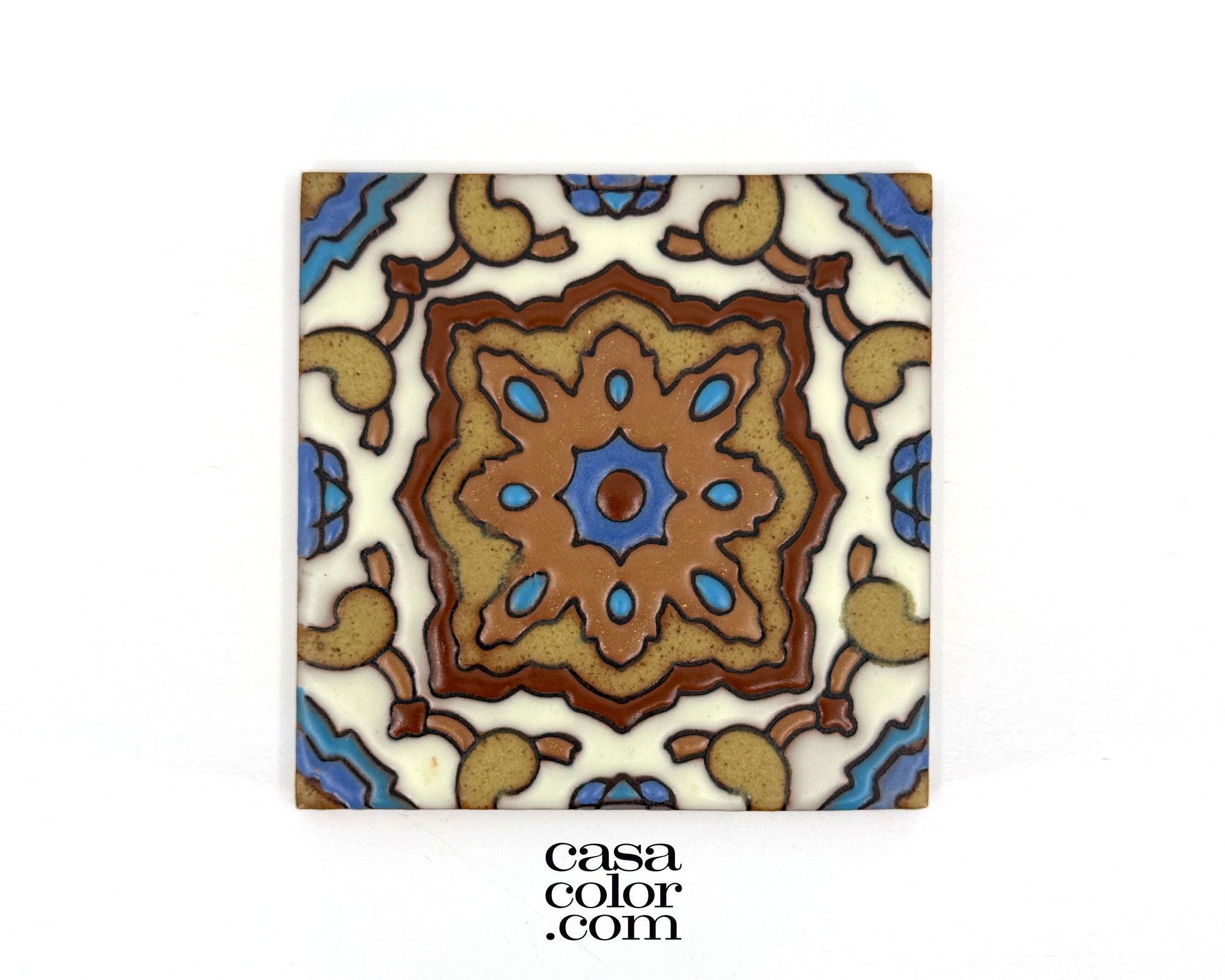 Blue and brown tile with a high relief surface. This tile is a 4 by 4 inch tile.