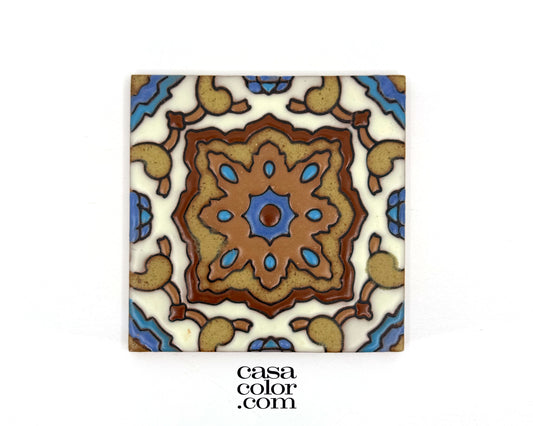 Blue and brown tile with a high relief surface. This tile is a 4 by 4 inch tile.