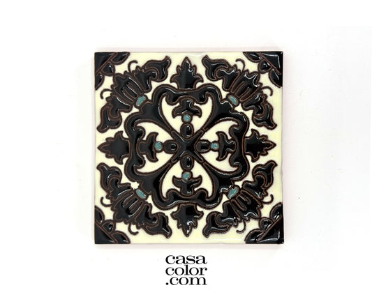Black and Ivory Tile. 4 inches by 4 inches with aqua dots